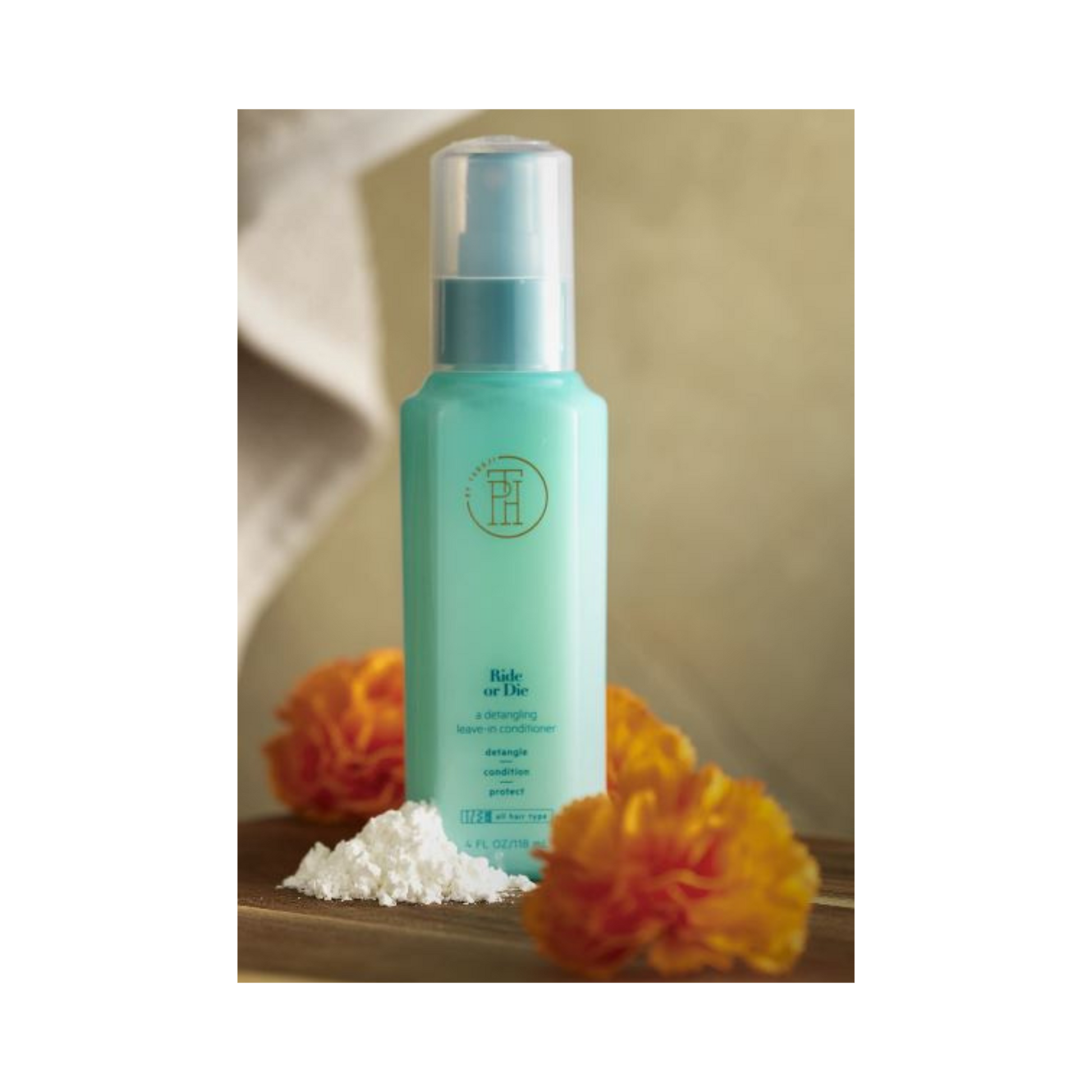 TPH by Taraji Ride or Die Leave-In Conditioner – A nourishing leave-in treatment with aloe vera, shea butter, and biotin to hydrate, detangle, and strengthen hair.