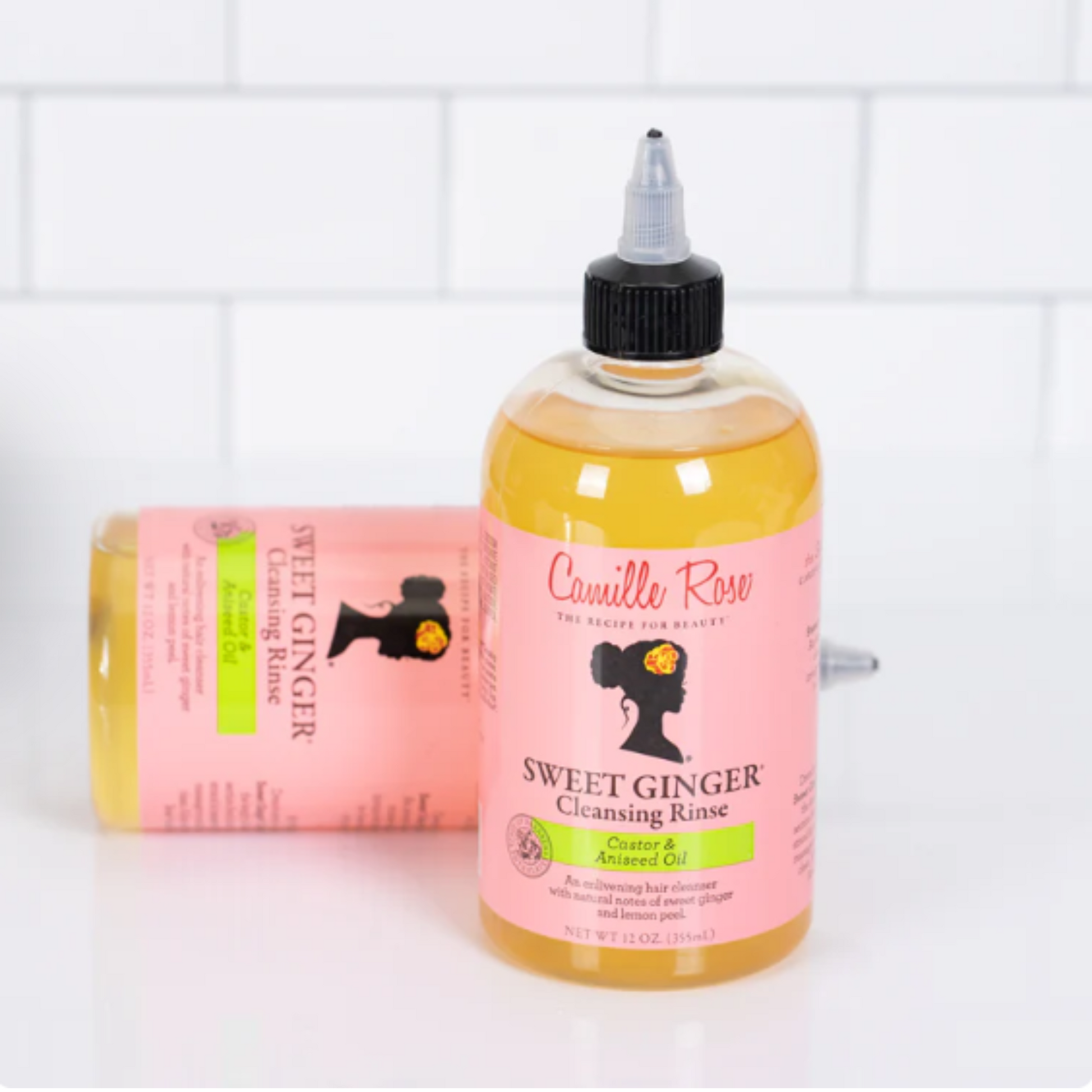 Camille Rose Sweet Ginger Cleansing Rinse – A sulfate-free hair cleanser infused with ginger, lemon, and castor oil for a gentle yet effective wash.