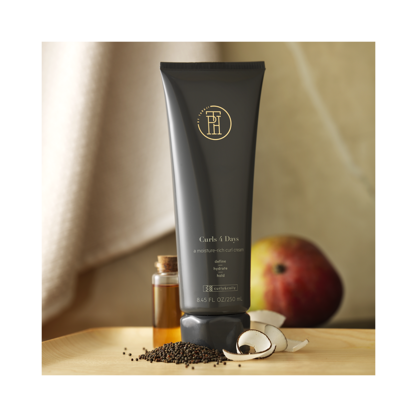TPH by Taraji Curls 4 Days Curl Crème – A lightweight curl-enhancing cream infused with shea butter and coconut oil for long-lasting definition and frizz-free hydration.