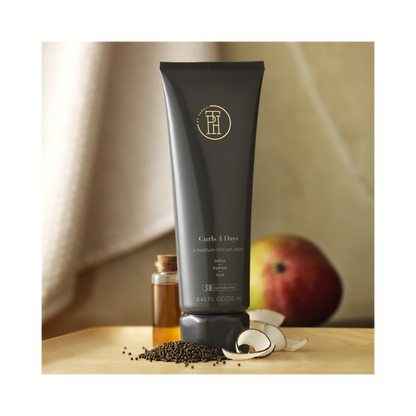 TPH by Taraji Curls 4 Days Curl Crème – A lightweight curl-enhancing cream infused with shea butter and coconut oil for long-lasting definition and frizz-free hydration.